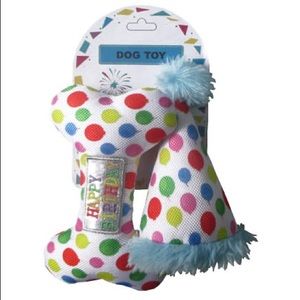 Two squeaky birthday dog toys.